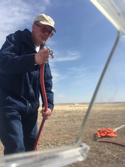 Neil preparing to connect the winch line, 3/20/2022
